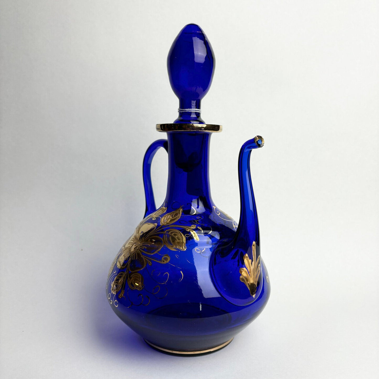 Bristol blue jug with gilt floral overlay (30cm tall)