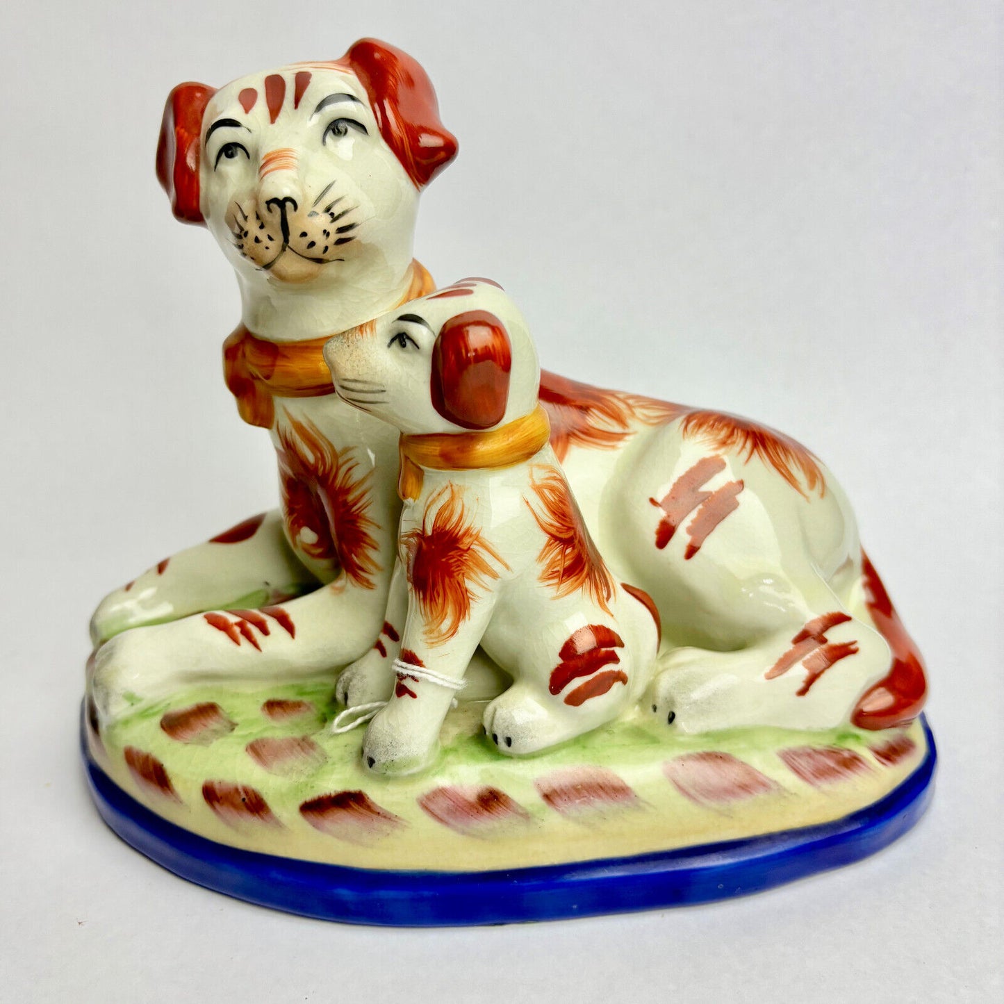 Pair of Antique Staffordshire Terriers with Puppy Bookends