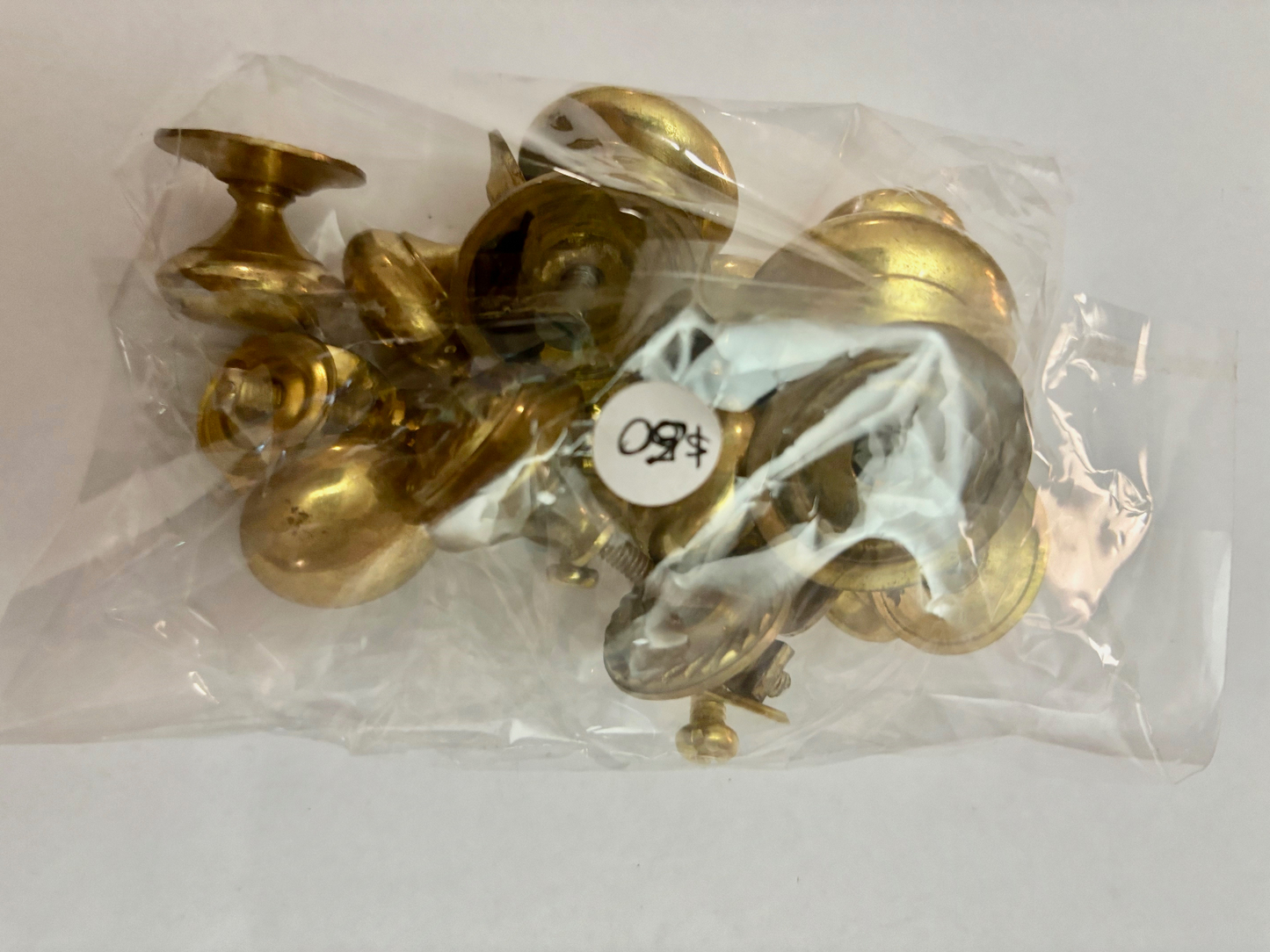 Twelve Mixed Antique Brass Drawer Pull Handles
