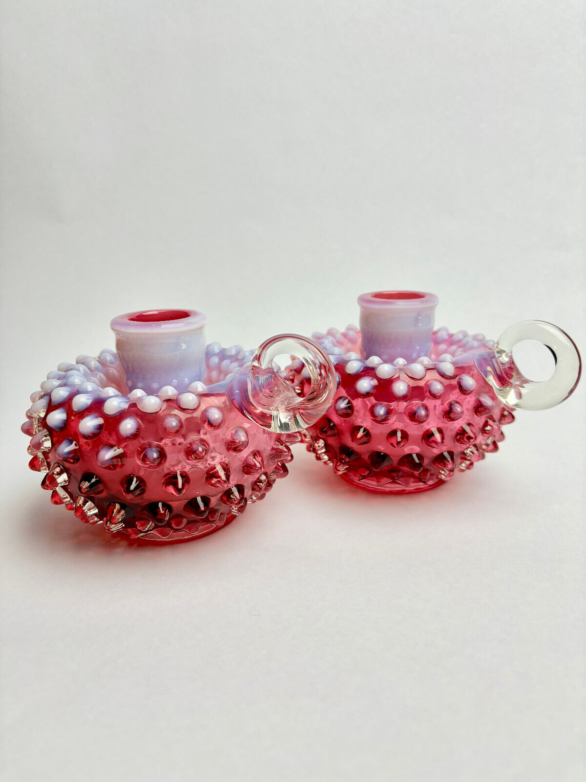 Pair of Fenton Cranberry Opalescent Hobnail Candlestick Holders (9cm tall)