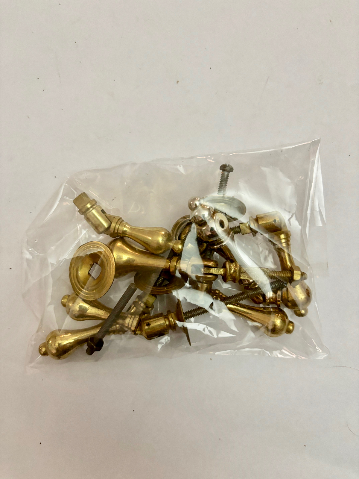 Seven Mixed Antique Brass Drawer Pull Handles (some incomplete)