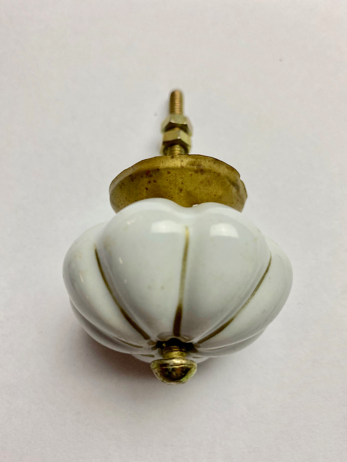 Four Vintage Door Knobs including porcelain and glass with brass mounts