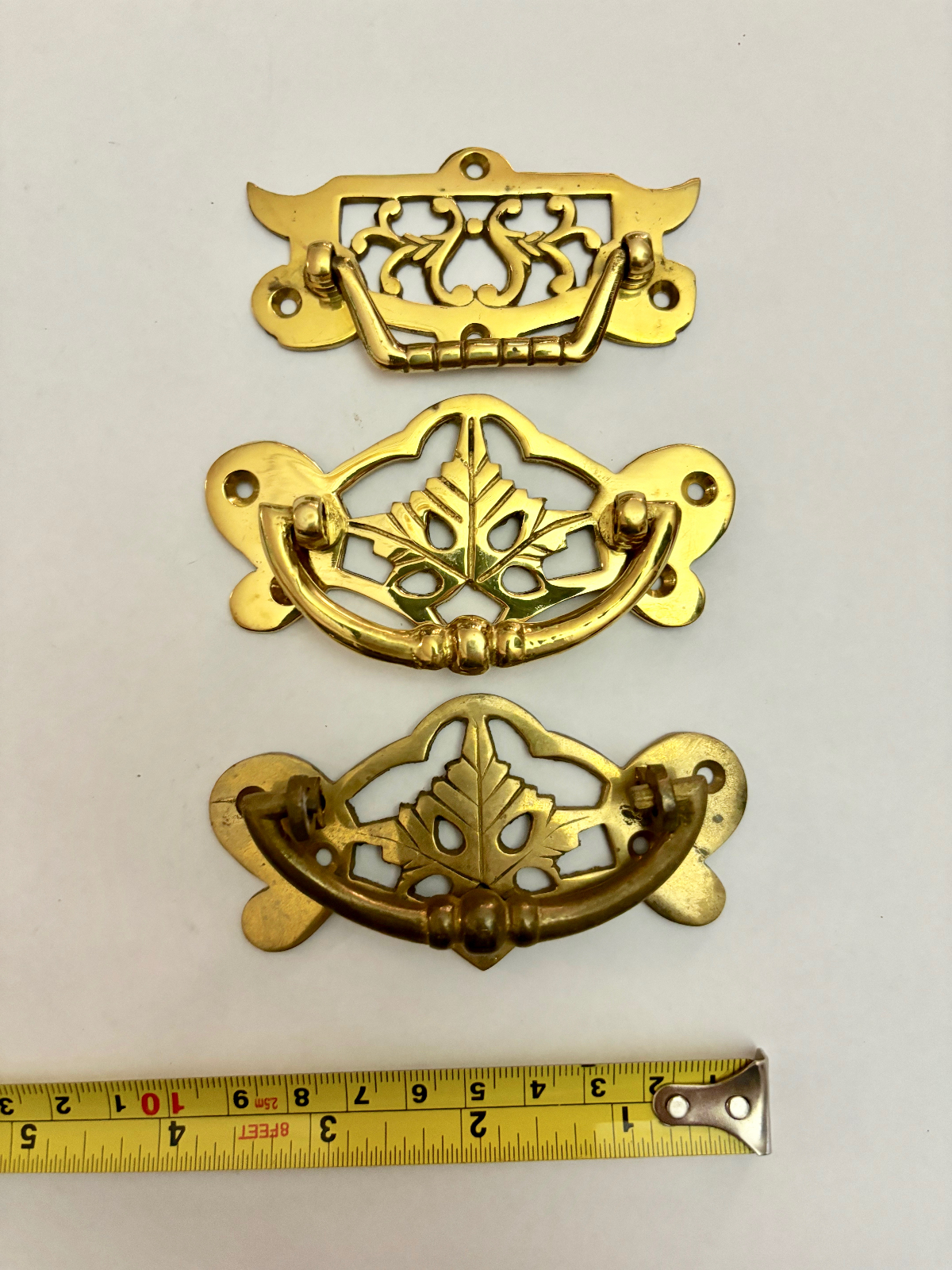 Three Mixed Antique Brass Drawer Pull Handles