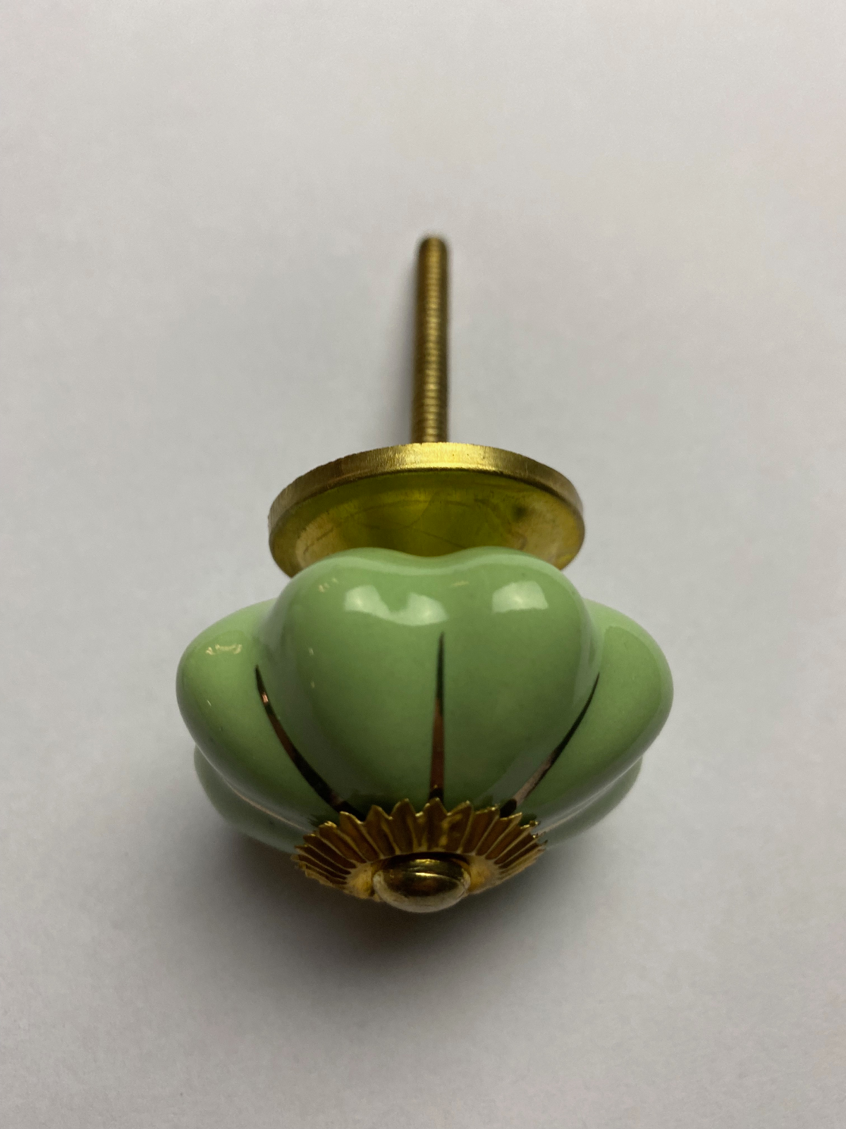 Four Vintage Door Knobs including porcelain and glass with brass mounts