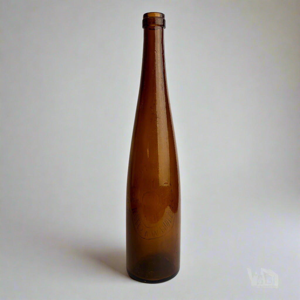 Brown glass bottle on a white background