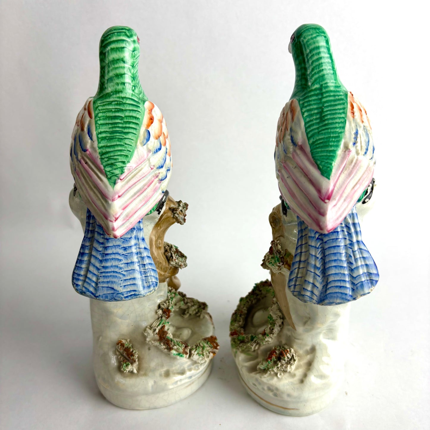 Pair of Antique Staffordshire pottery figurines of exotic pigeons with nests