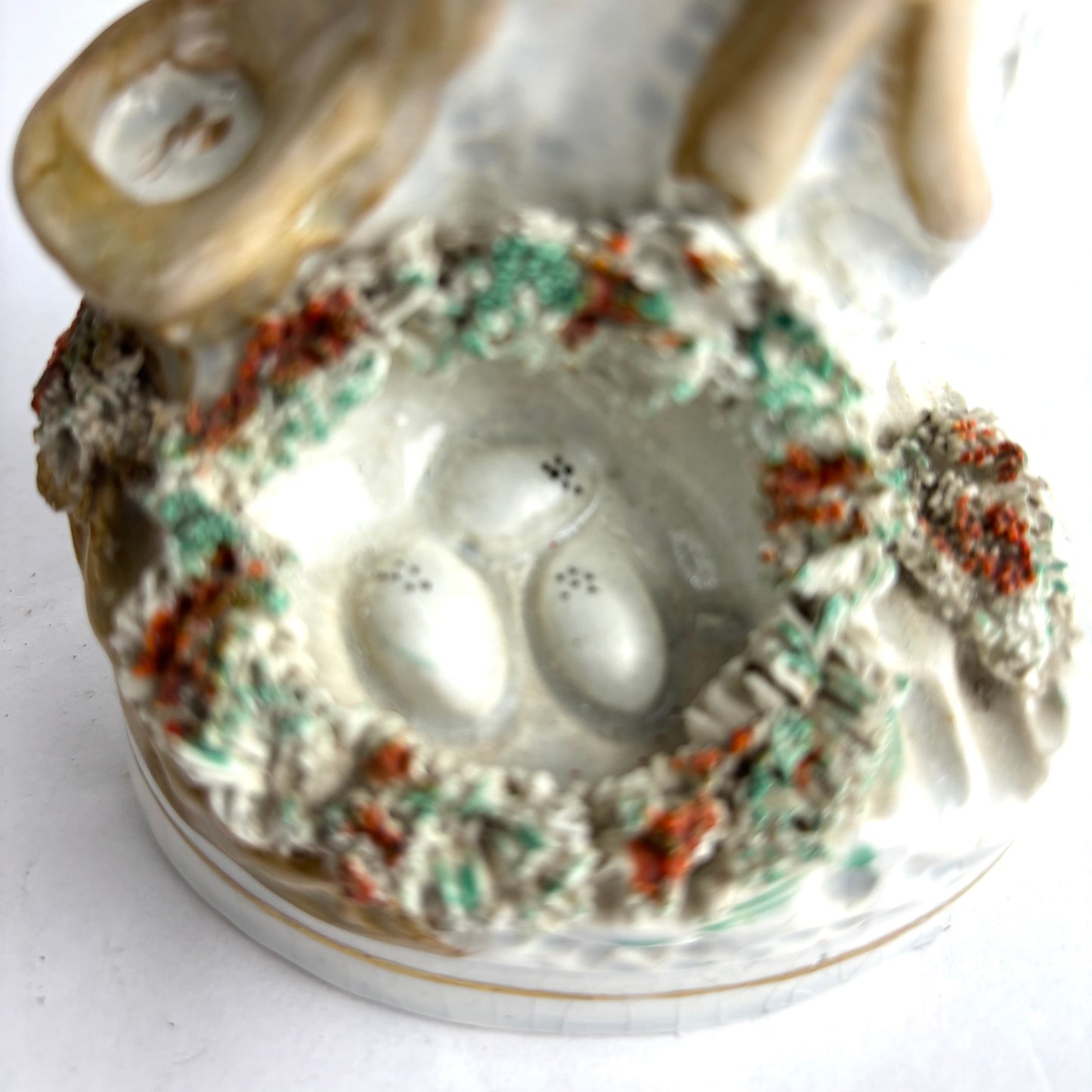 Pair of Antique Staffordshire pottery figurines of exotic pigeons with nests