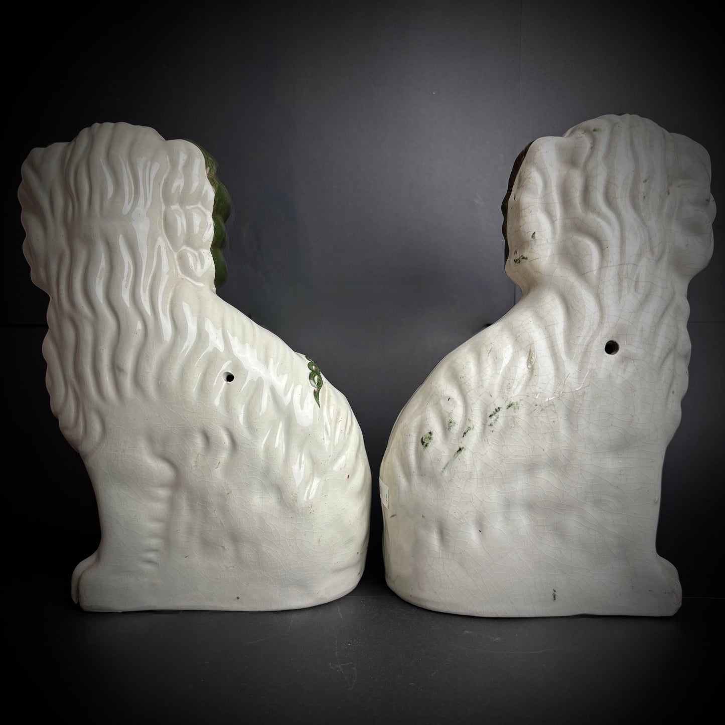 Pair of antique Staffordshire Green Lustre Spaniels