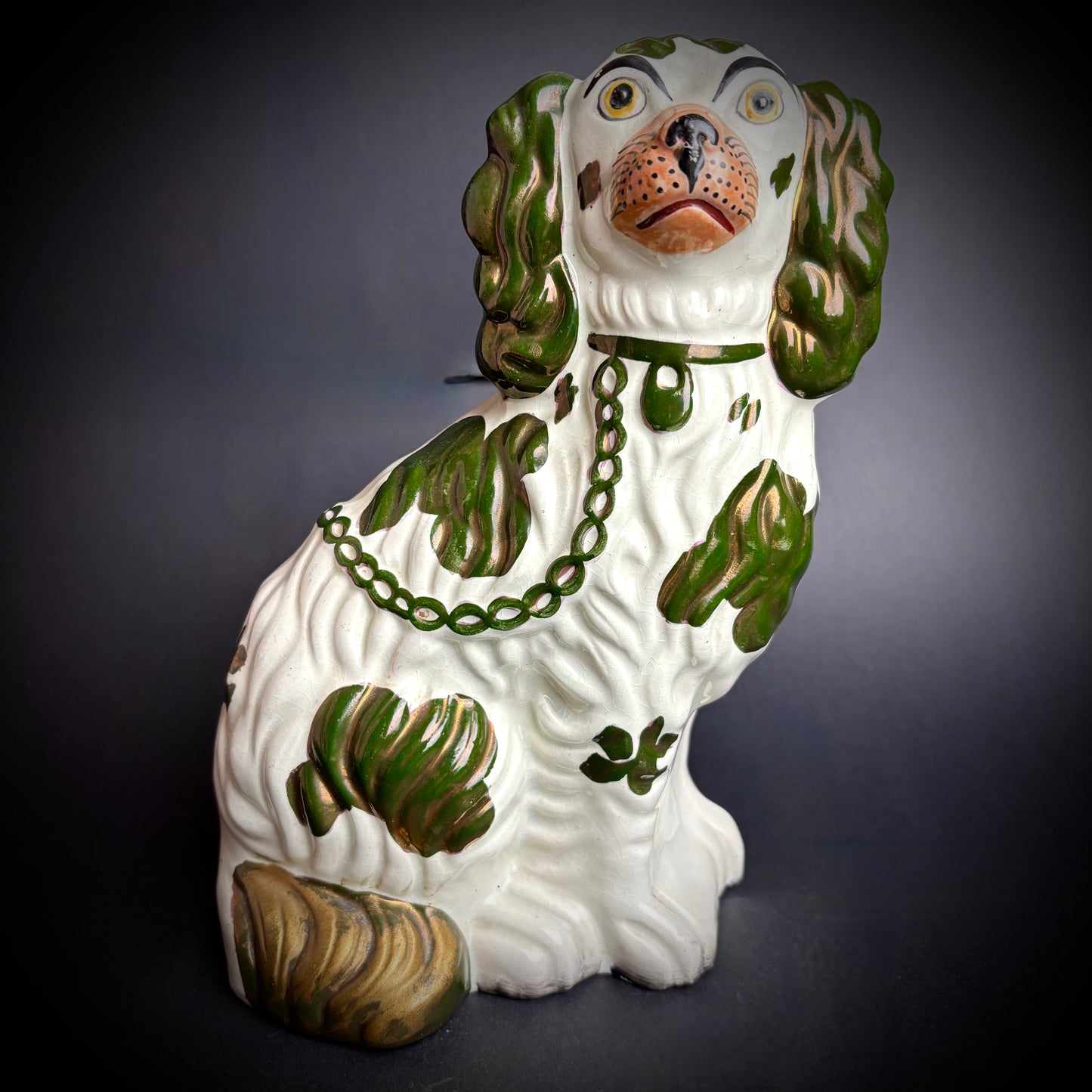 Pair of antique Staffordshire Green Lustre Spaniels