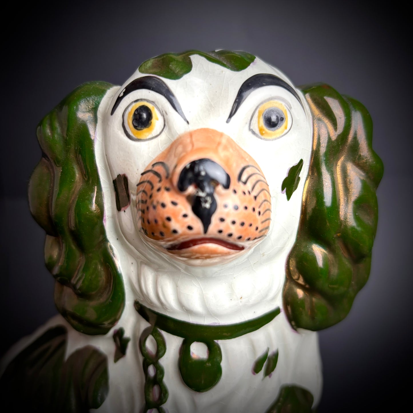 Pair of antique Staffordshire Green Lustre Spaniels