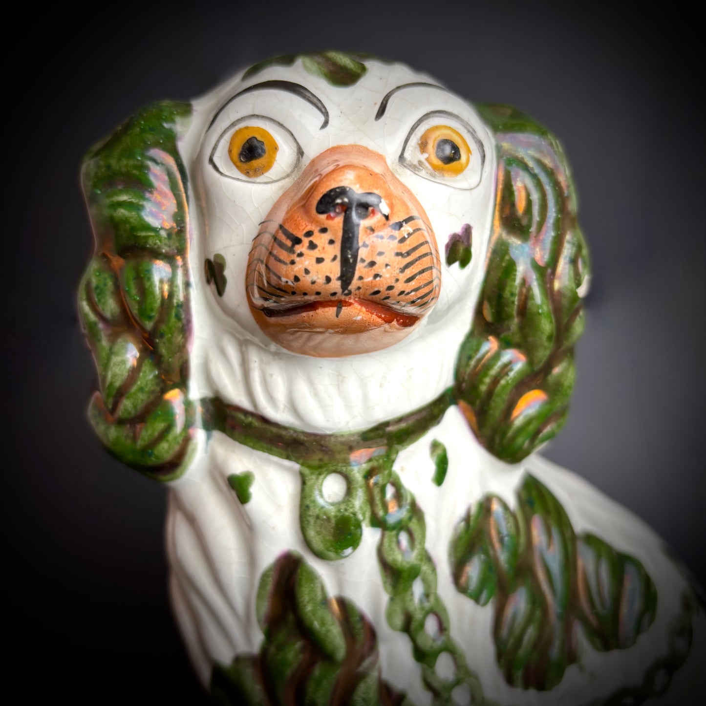 Pair of antique Staffordshire Green Lustre Spaniels