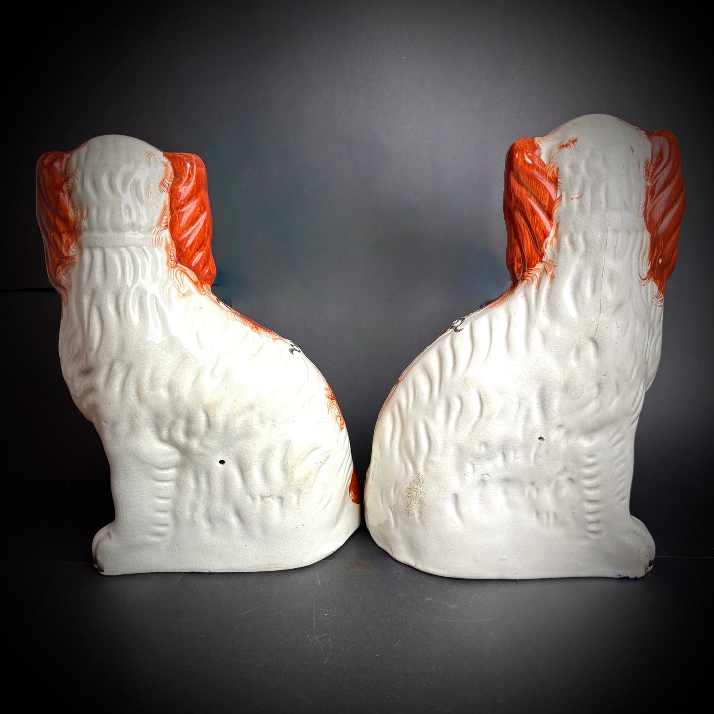 Pair of antique Staffordshire Spaniels
