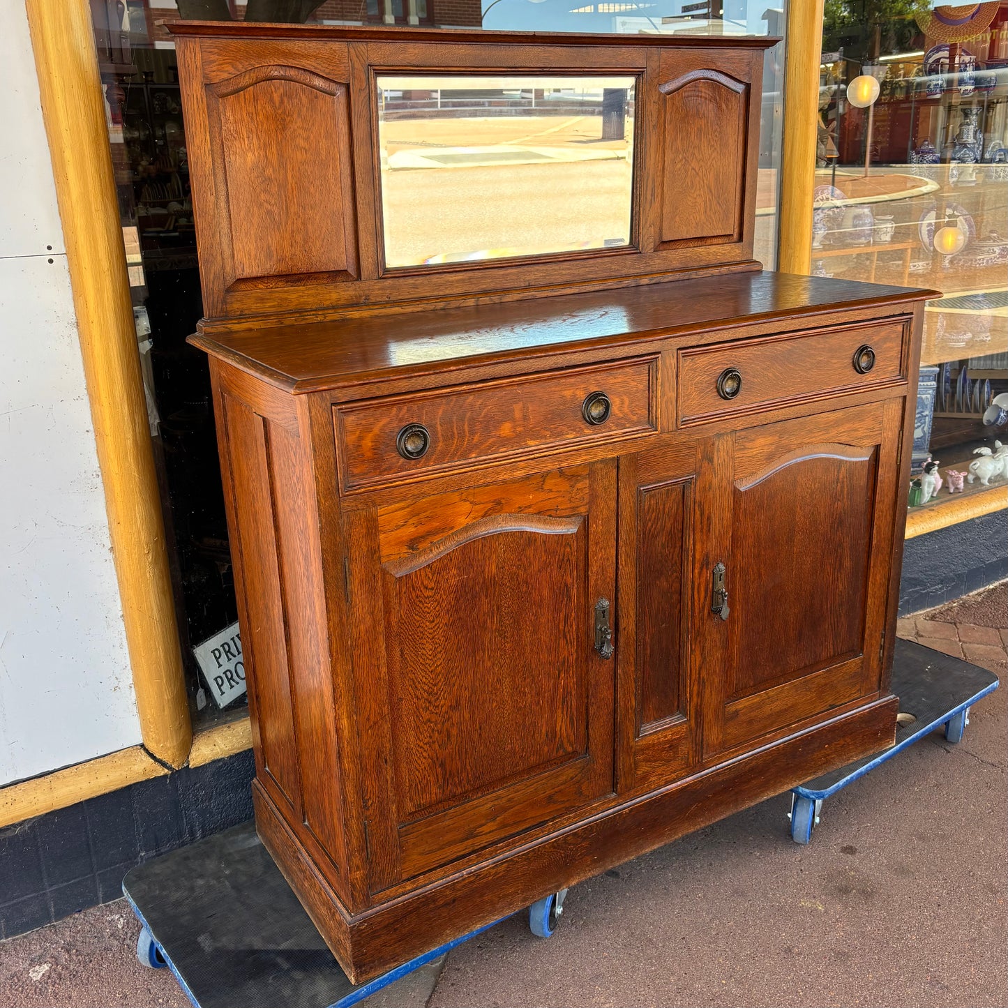 Edwardian tiger oak sideboard with a short mirror-back
