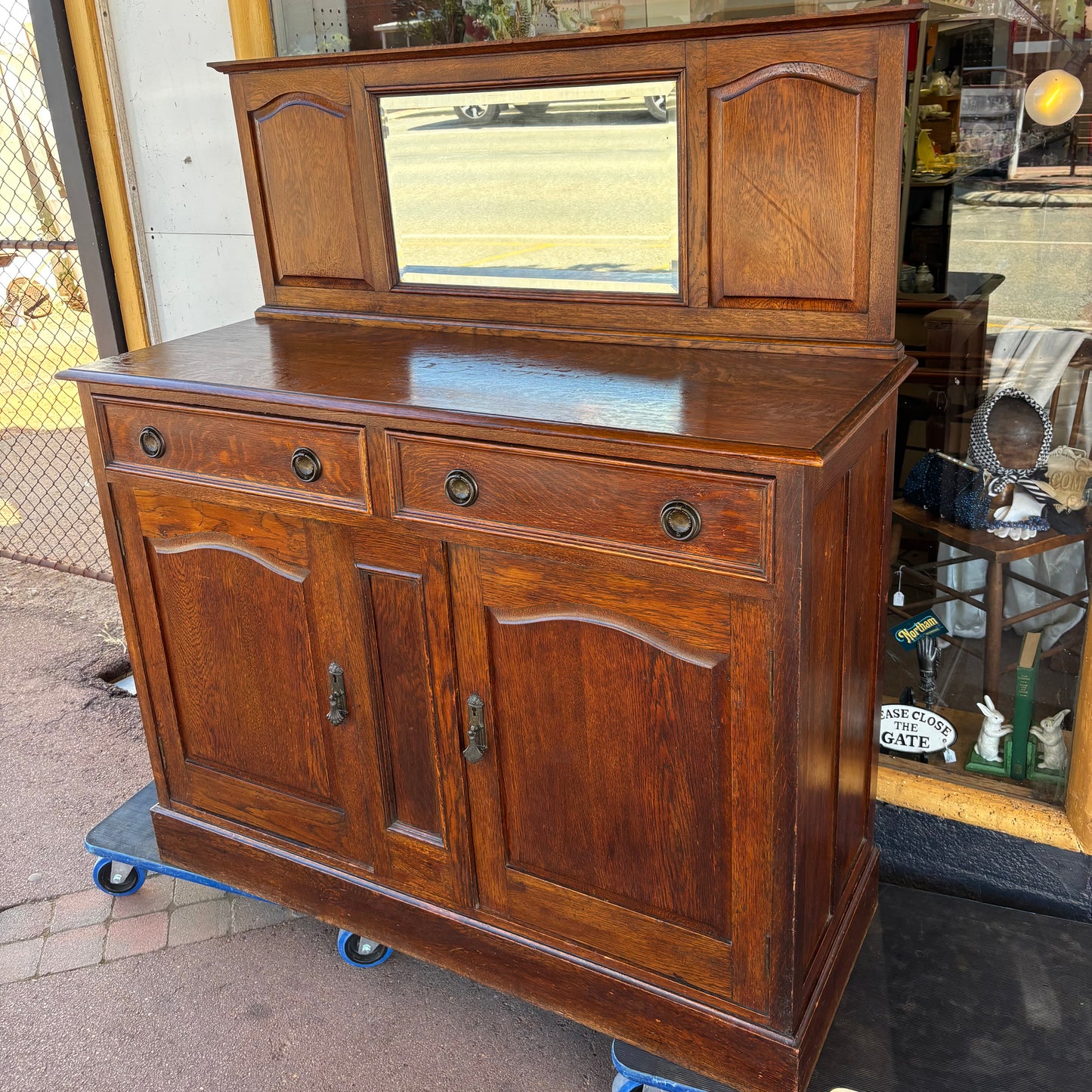 Edwardian tiger oak sideboard with a short mirror-back