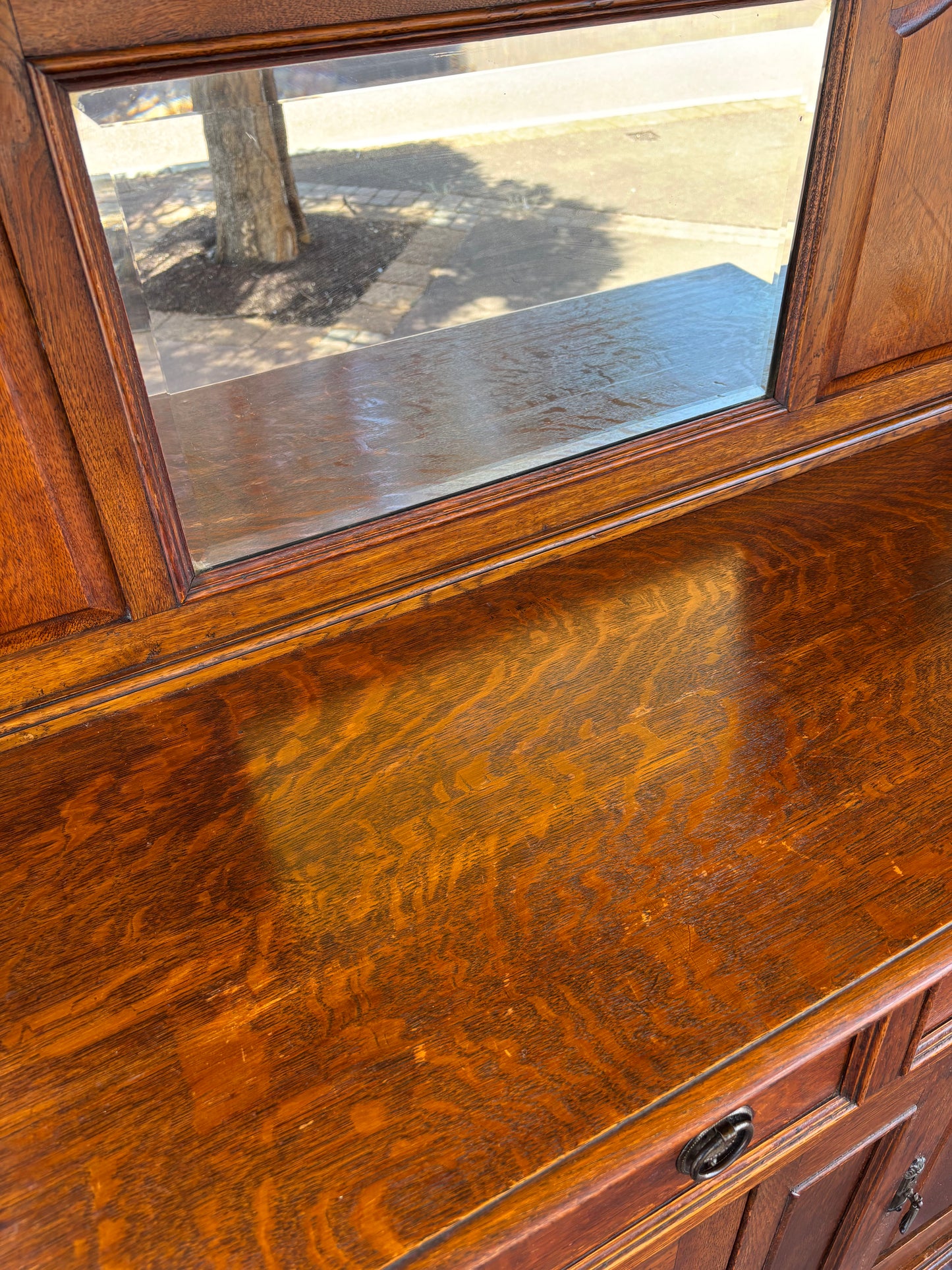 Edwardian tiger oak sideboard with a short mirror-back