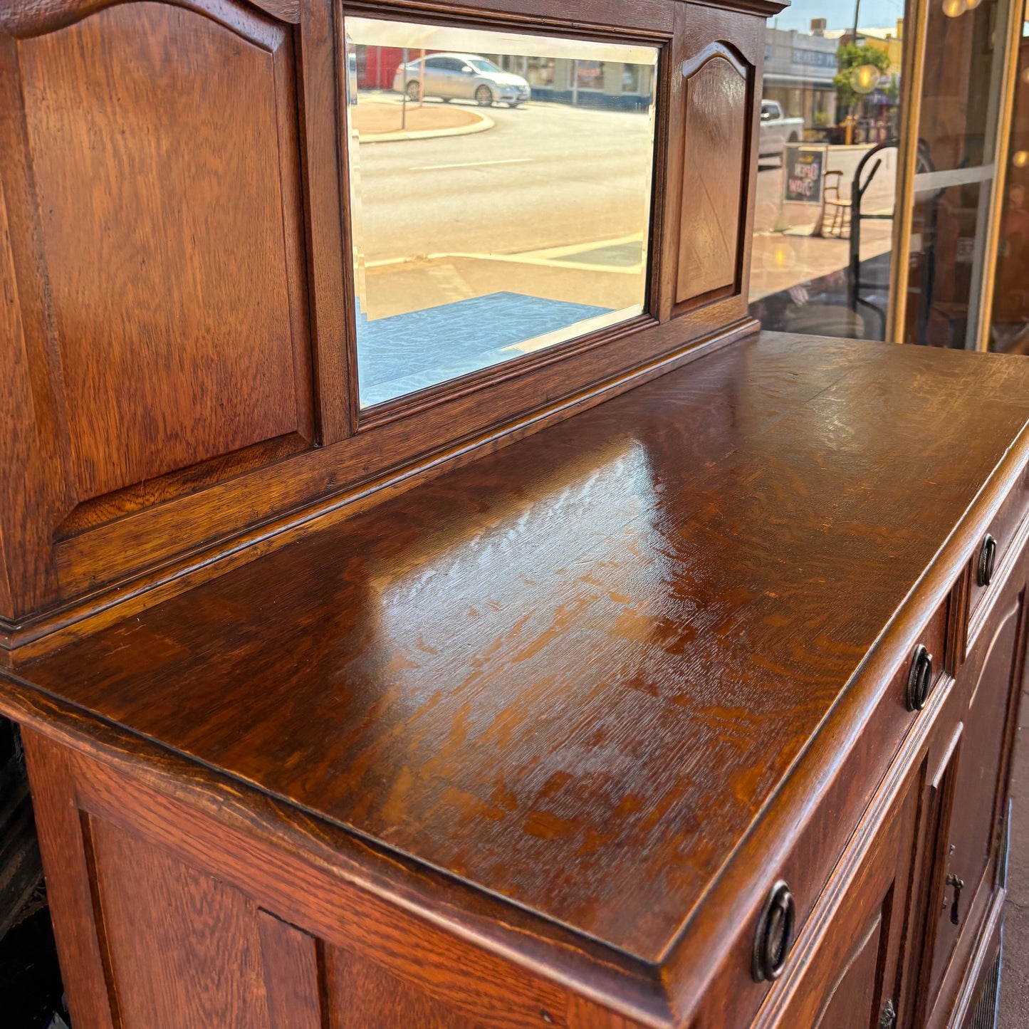 Edwardian tiger oak sideboard with a short mirror-back