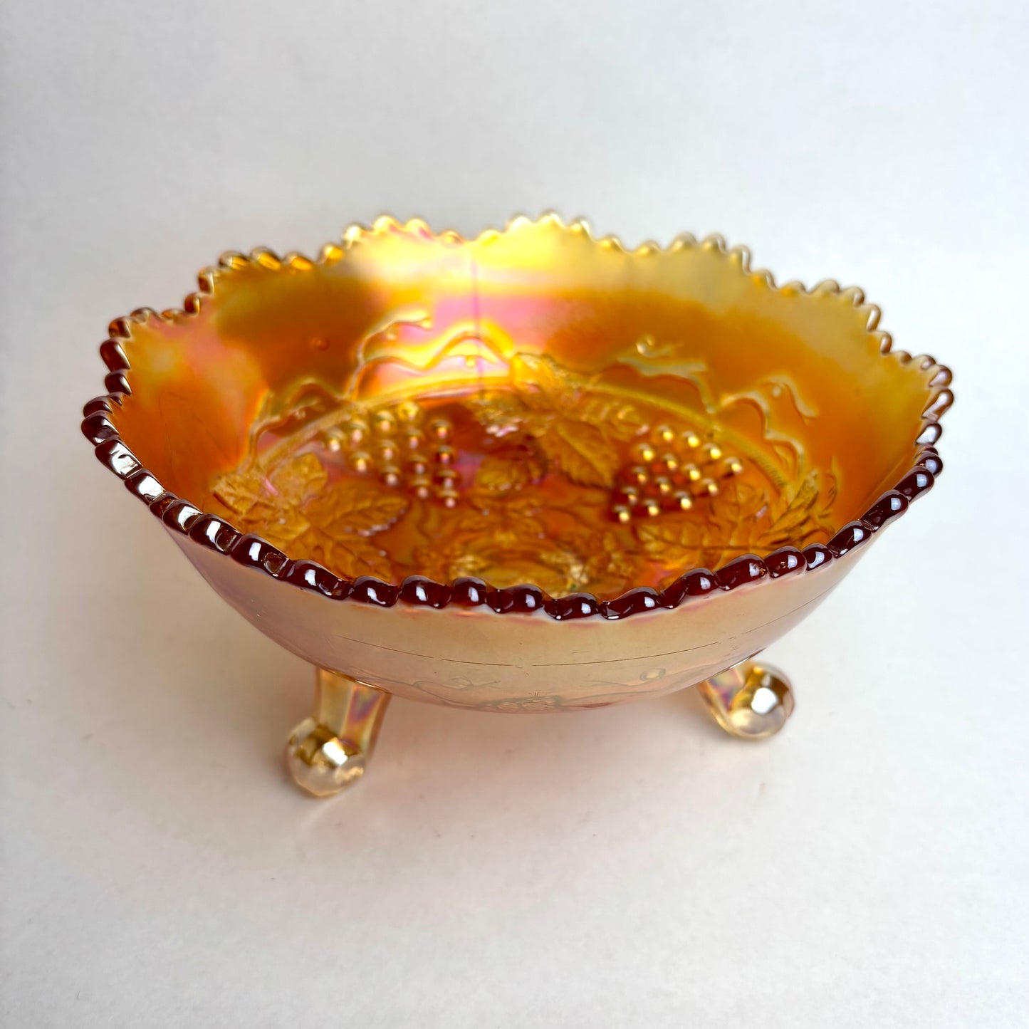 Fenton Marigold Carnival Glass Grape and Cable Footed Bowl