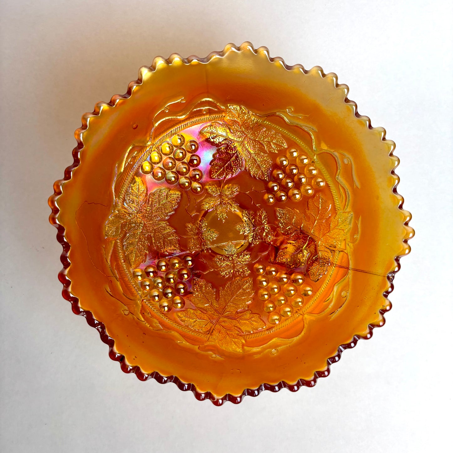 Fenton Marigold Carnival Glass Grape and Cable Footed Bowl