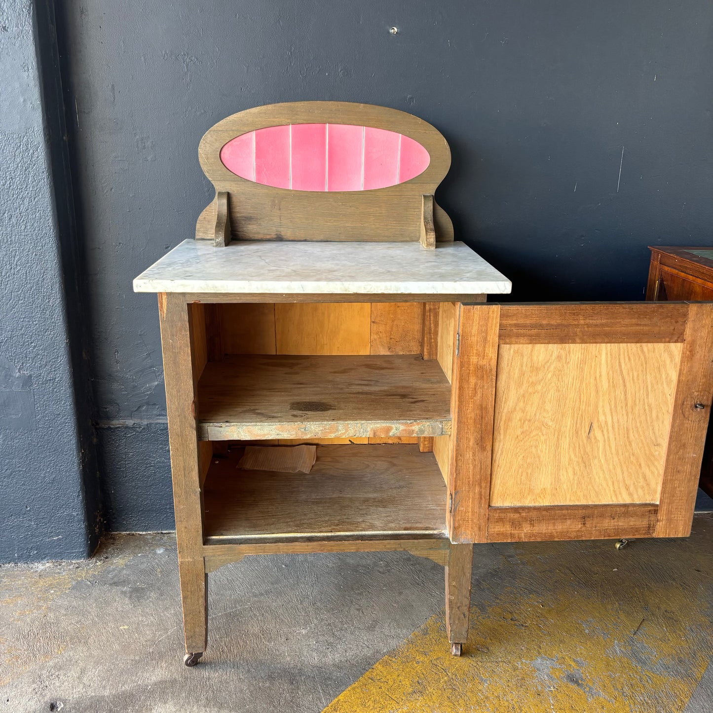 Antique Marble Top Washstand with Pink Tile Splashback on Castors