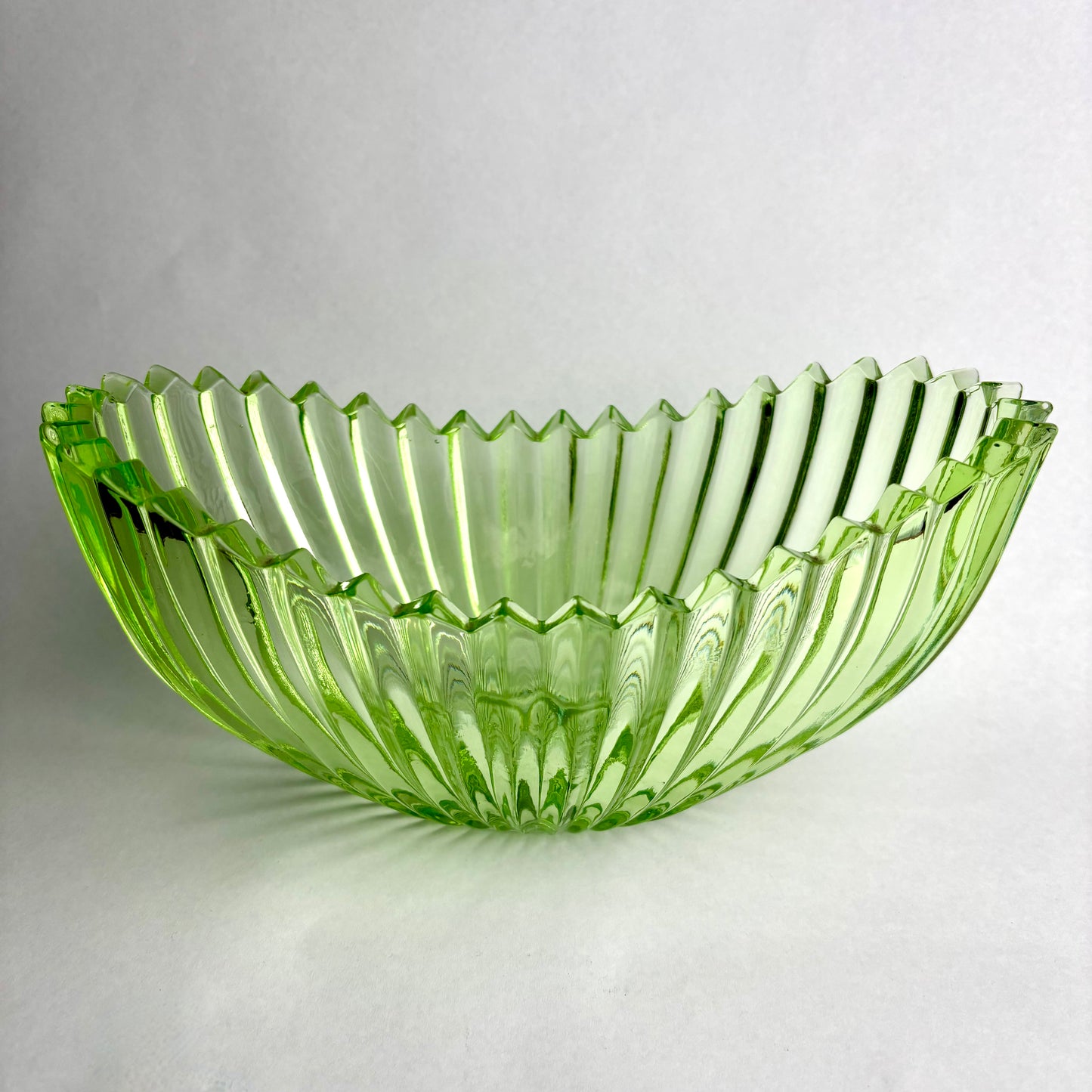 Vintage Pressed Green Glass Bowl – Ribbed Flared Form with Sawtooth Rim (c.1950s–70s)