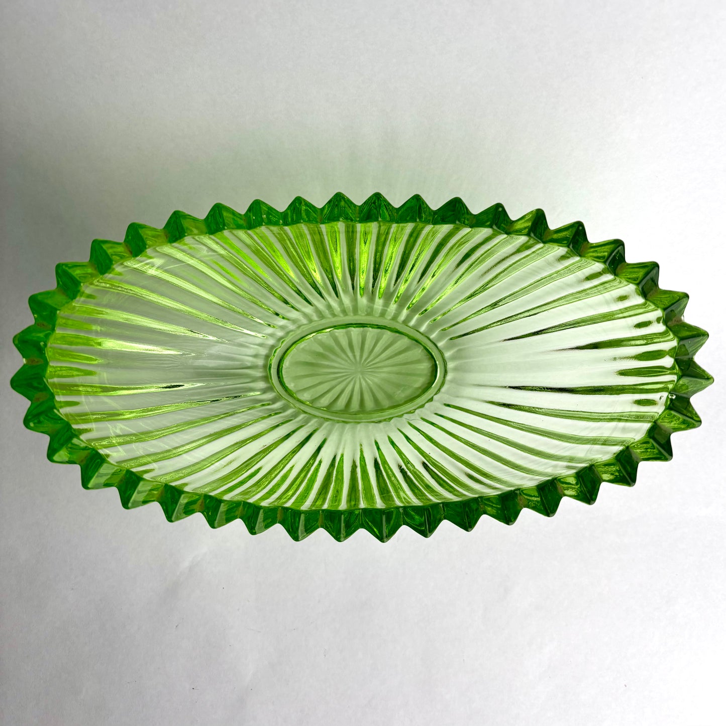 Vintage Pressed Green Glass Bowl – Ribbed Flared Form with Sawtooth Rim (c.1950s–70s)