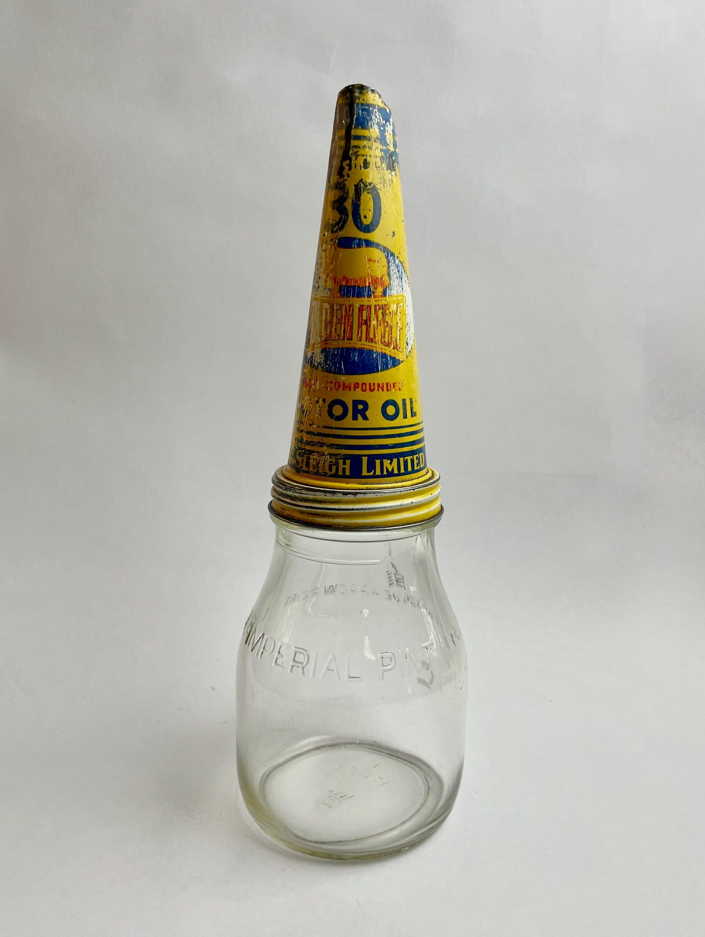 Golden Fleece tin oil bottle pourer with one imperial pint bottle