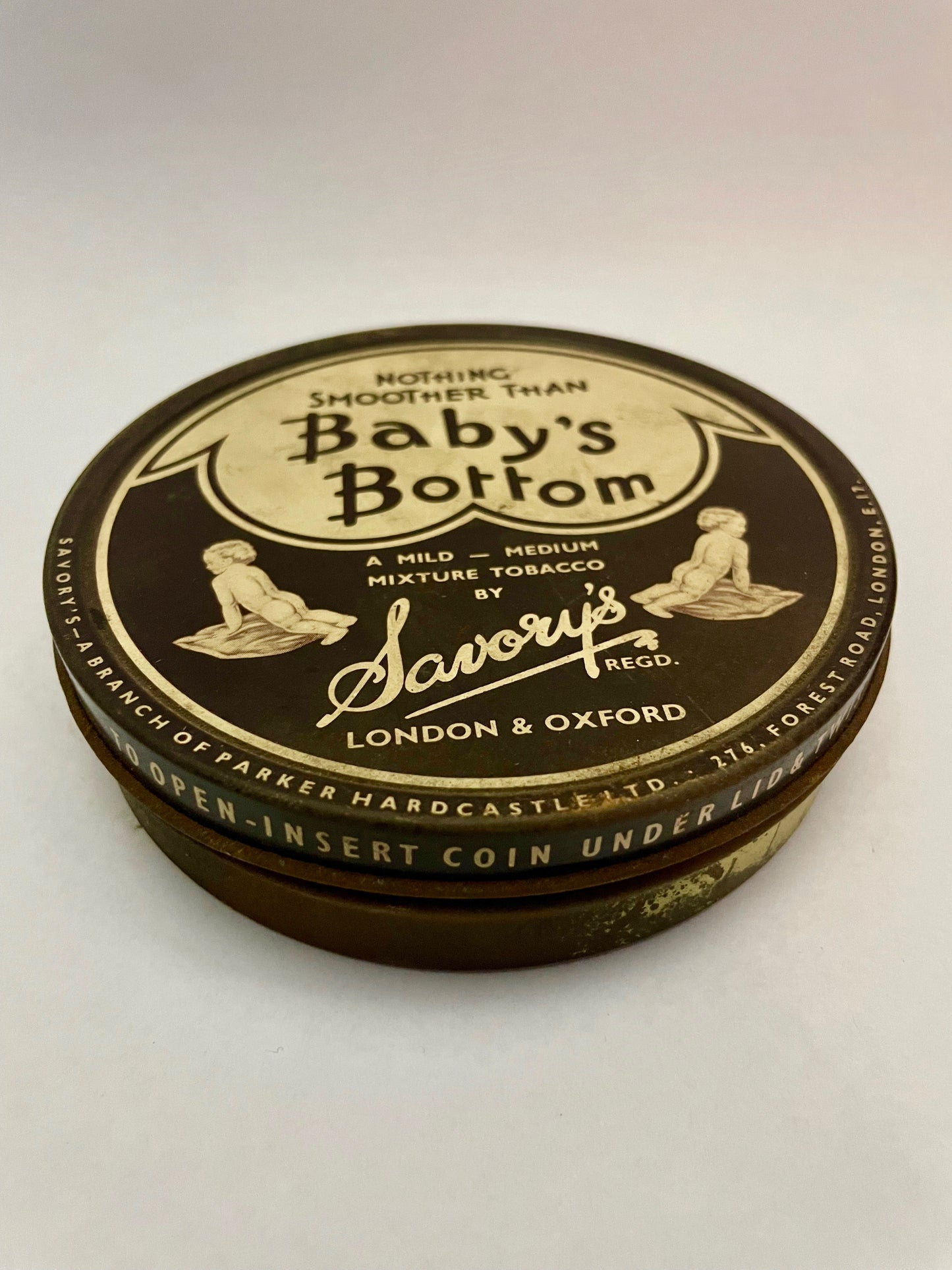 Baby's Bottom tobacco tin