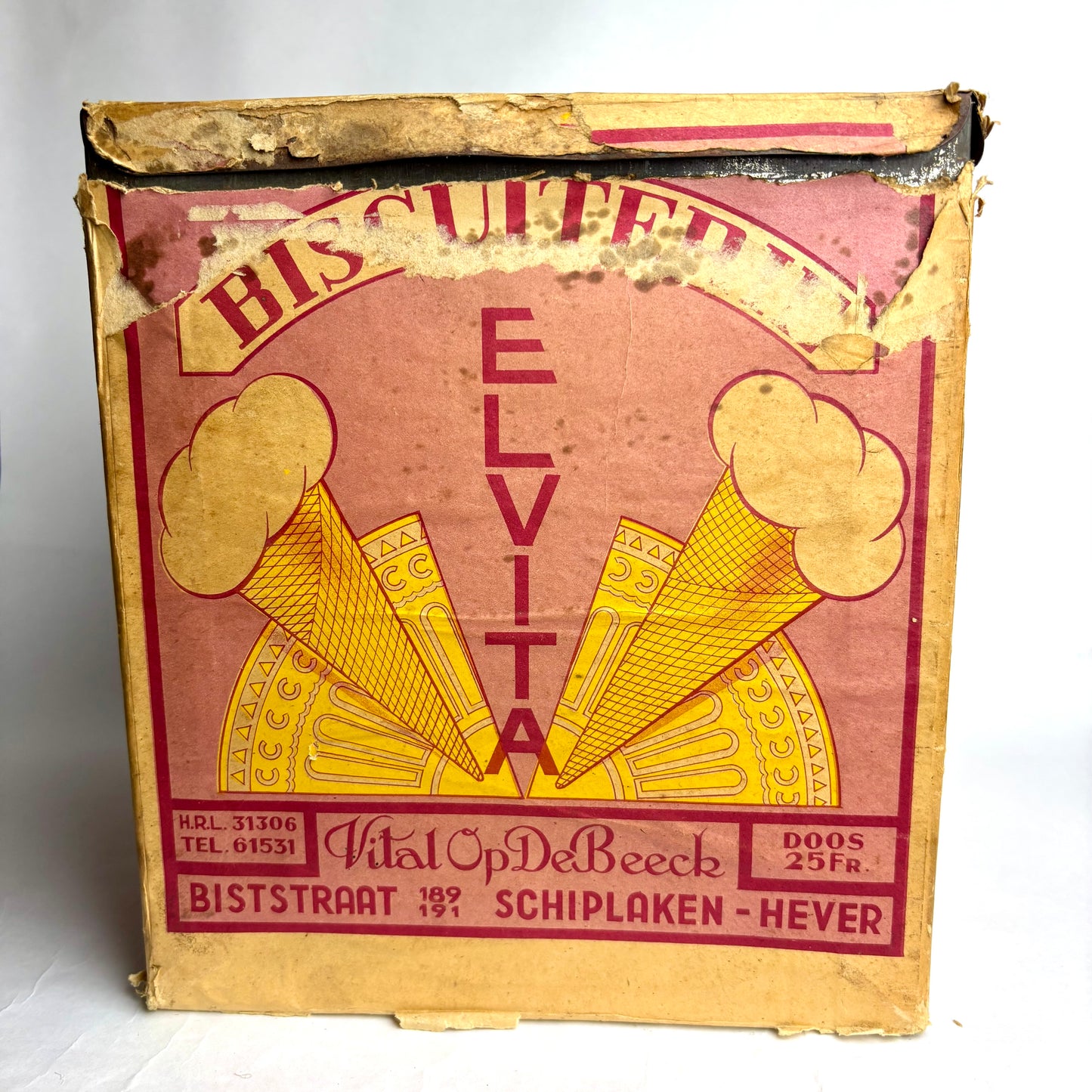 Vintage Elvita ice cream cone box with yellow graphics on a white background