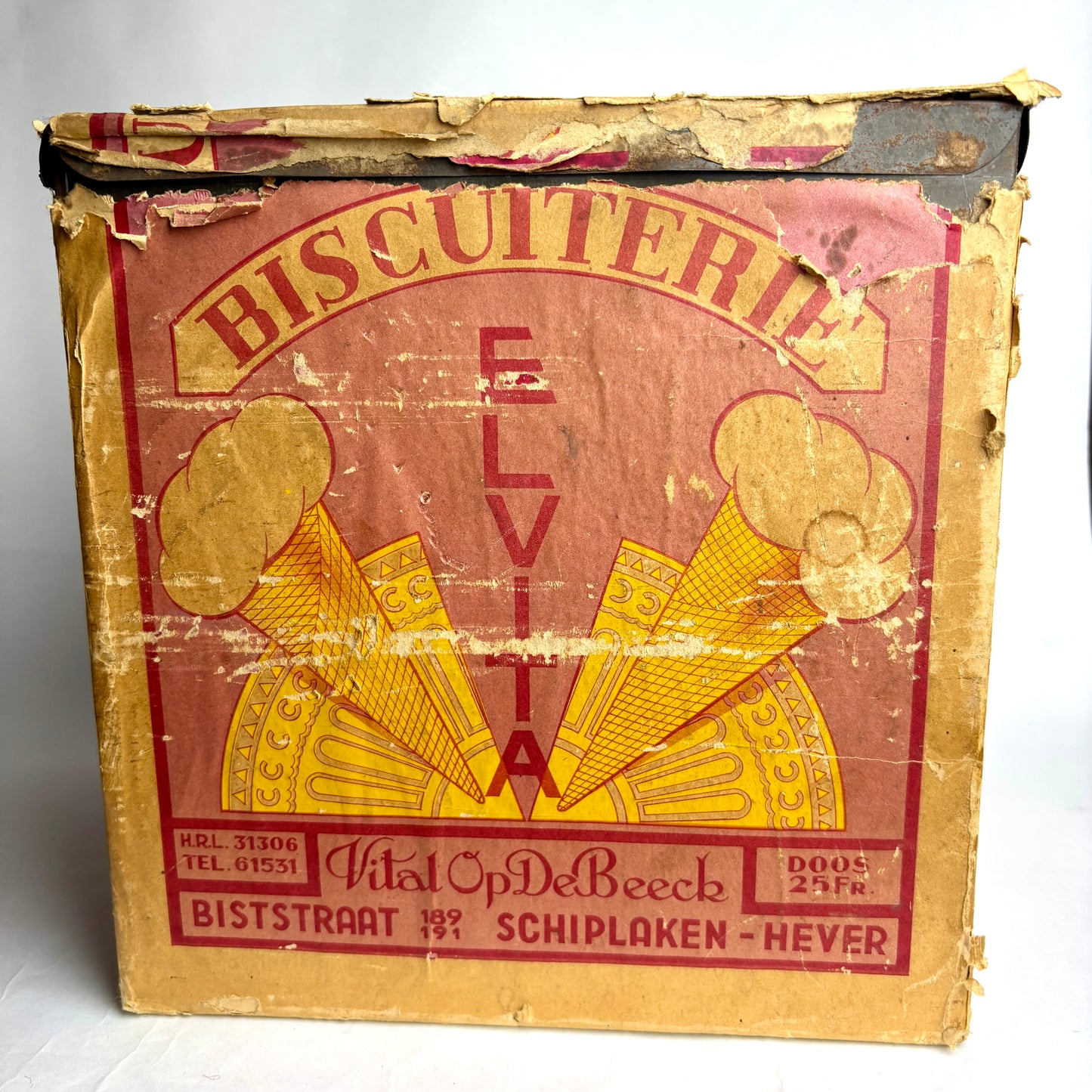 Vintage biscuit box with 'Biscuiterie Elvita' branding and ice cream cone graphics.
