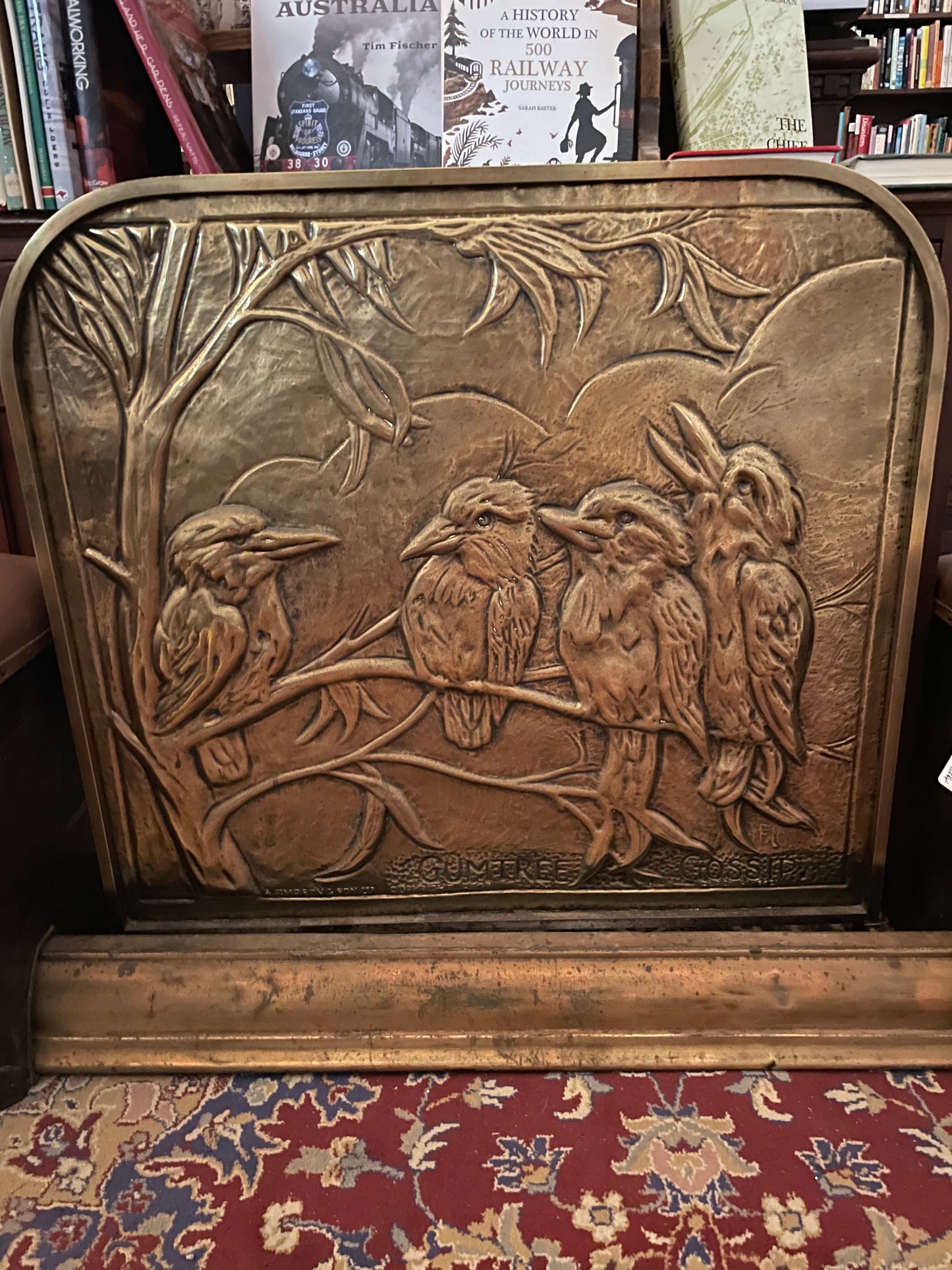 Antique Victorian brass fire surround featuring kookaburras