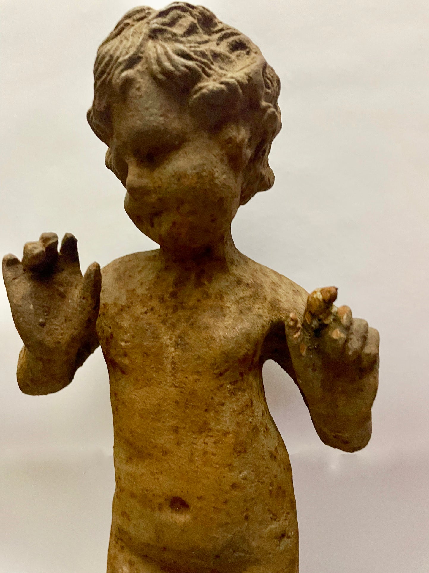 Cast iron boy statue