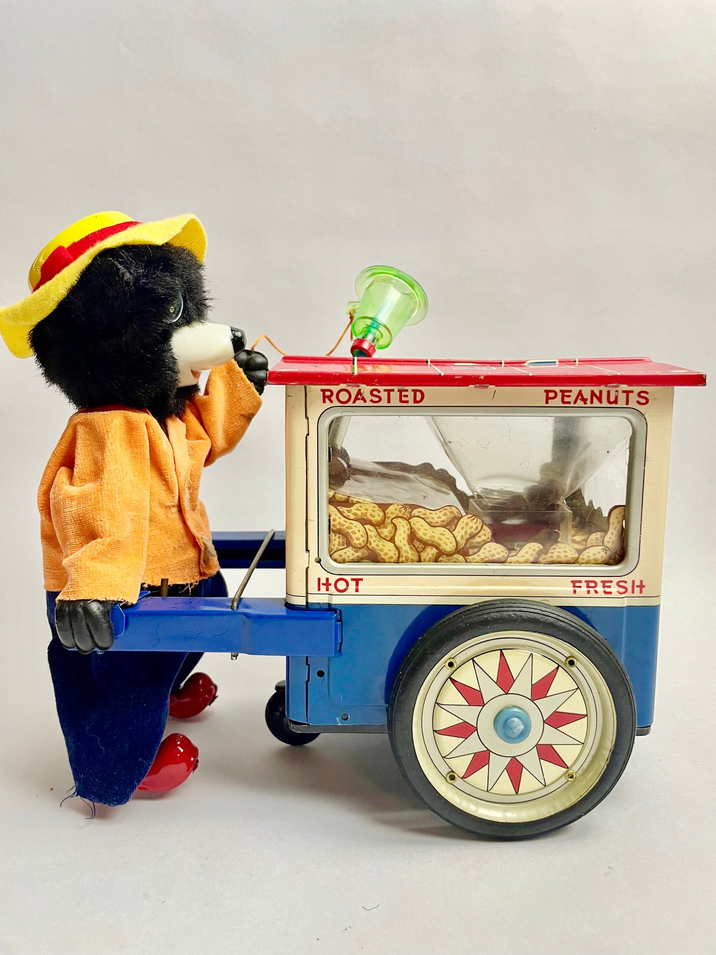 The Jolly Peanut Vendor Walking bear & Rolling Cart