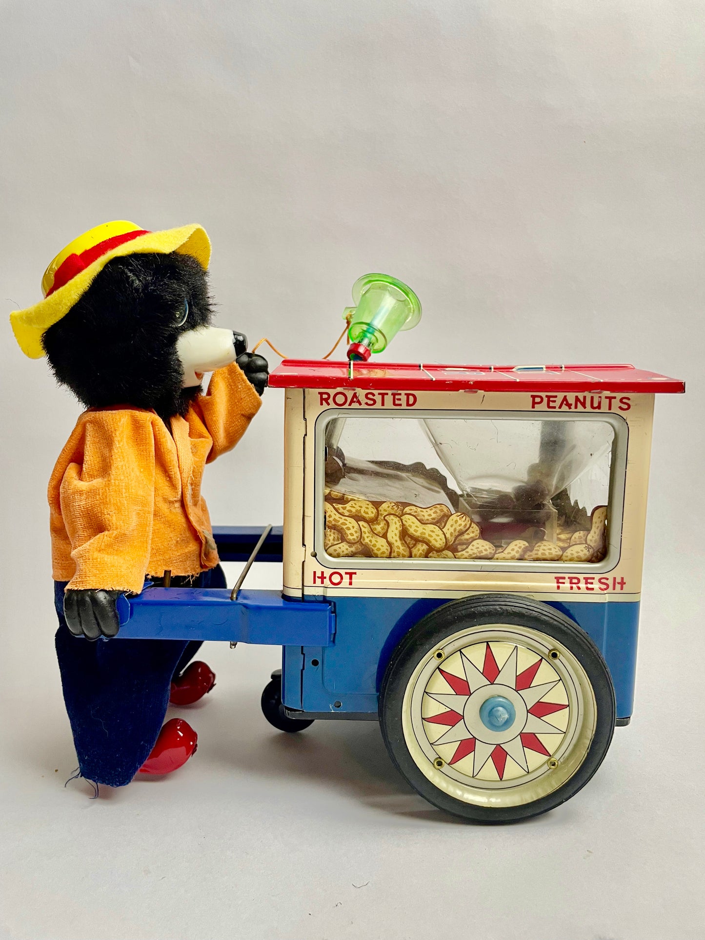 The Jolly Peanut Vendor Walking bear & Rolling Cart