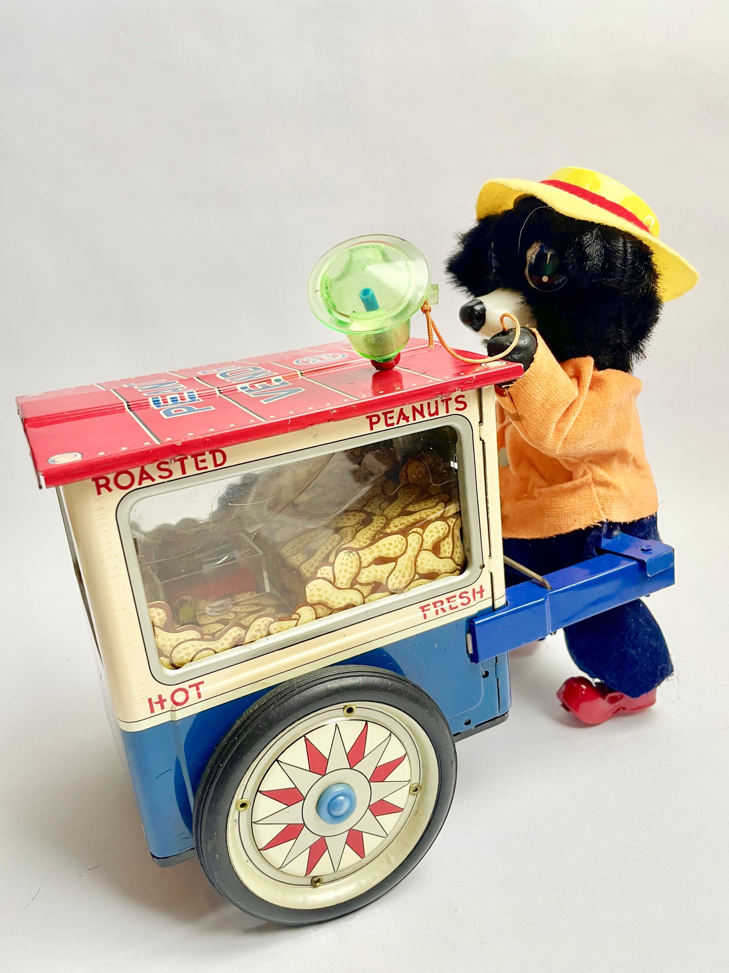 The Jolly Peanut Vendor Walking bear & Rolling Cart
