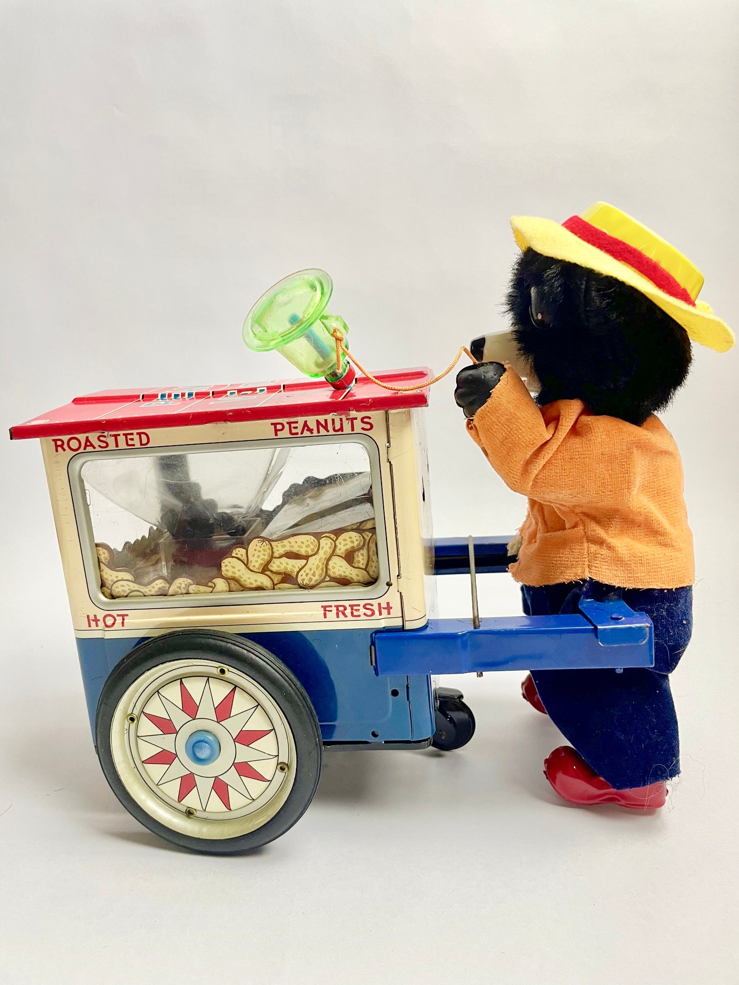 The Jolly Peanut Vendor Walking bear & Rolling Cart