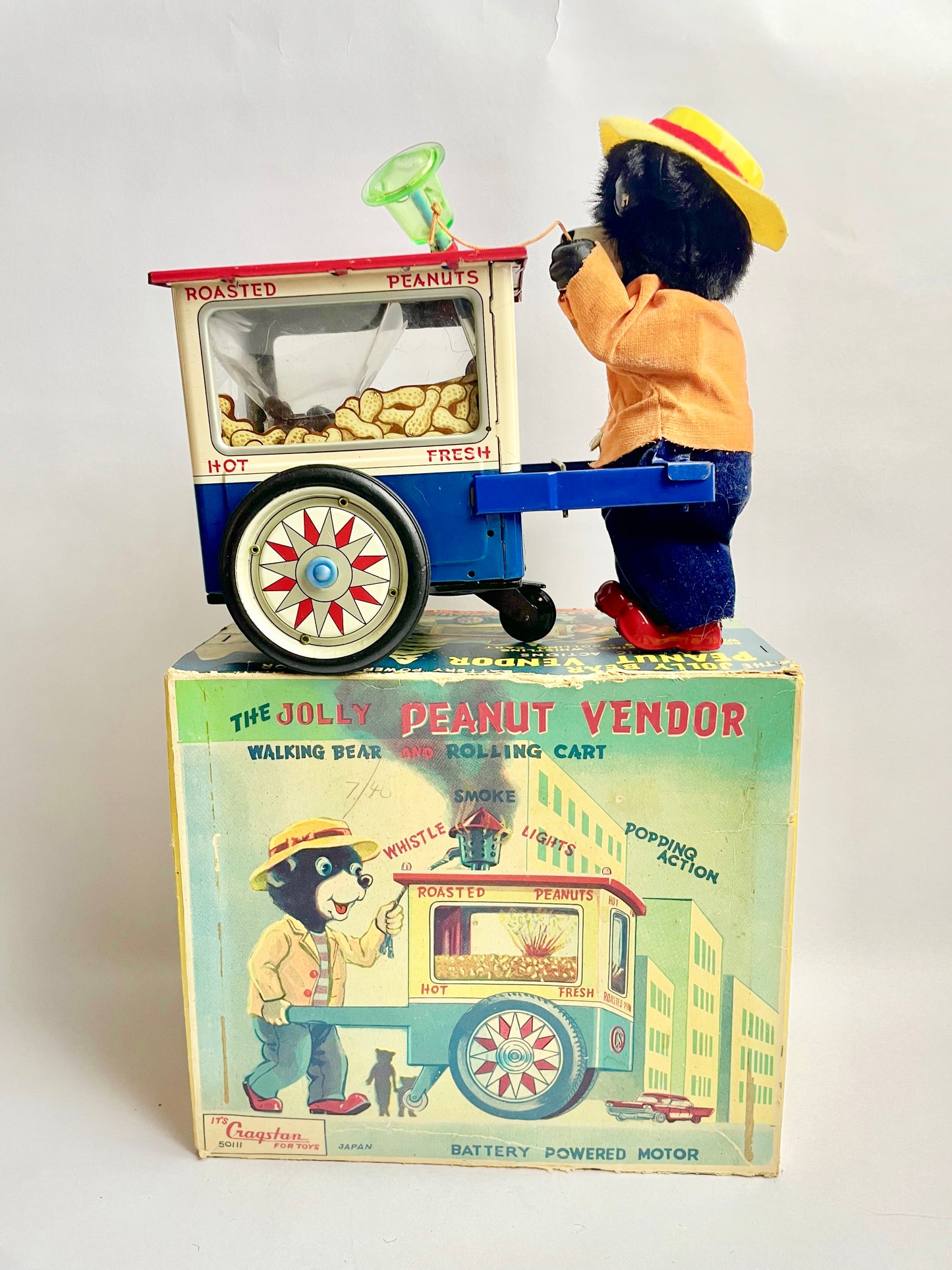 The Jolly Peanut Vendor Walking bear & Rolling Cart