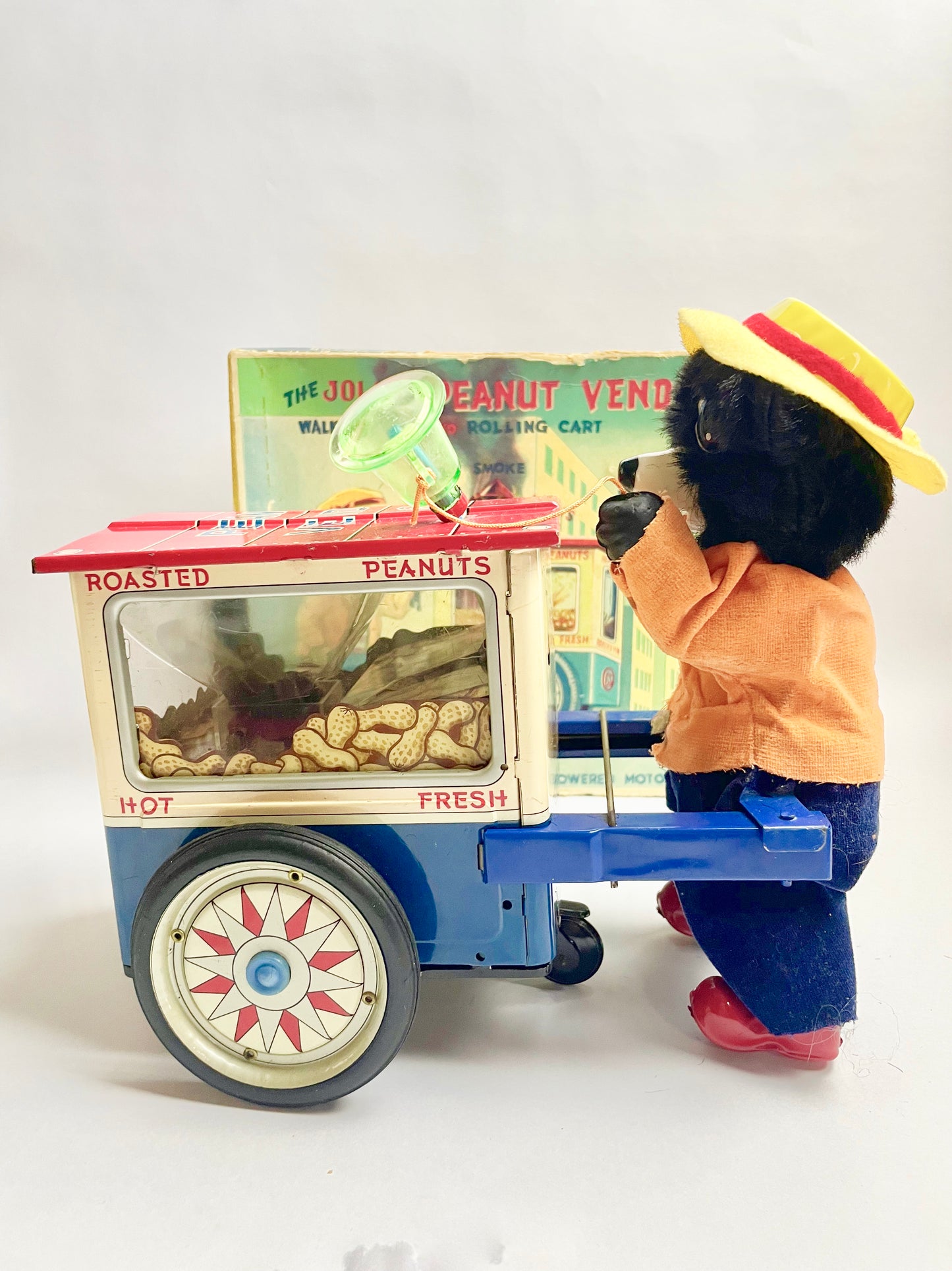 The Jolly Peanut Vendor Walking bear & Rolling Cart