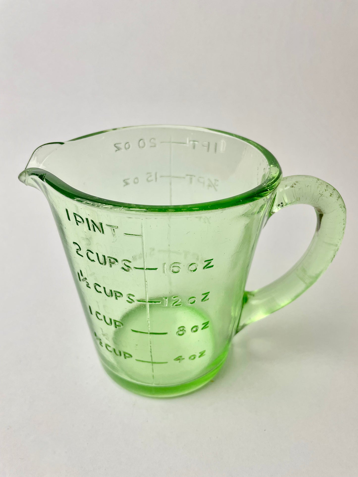 One Pint Green Depression Glass Measuring Jug