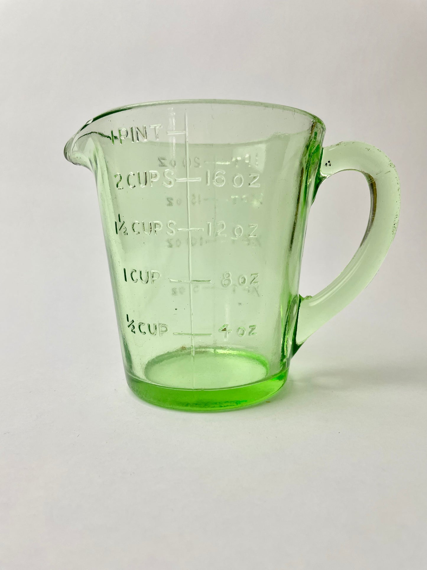 One Pint Green Depression Glass Measuring Jug