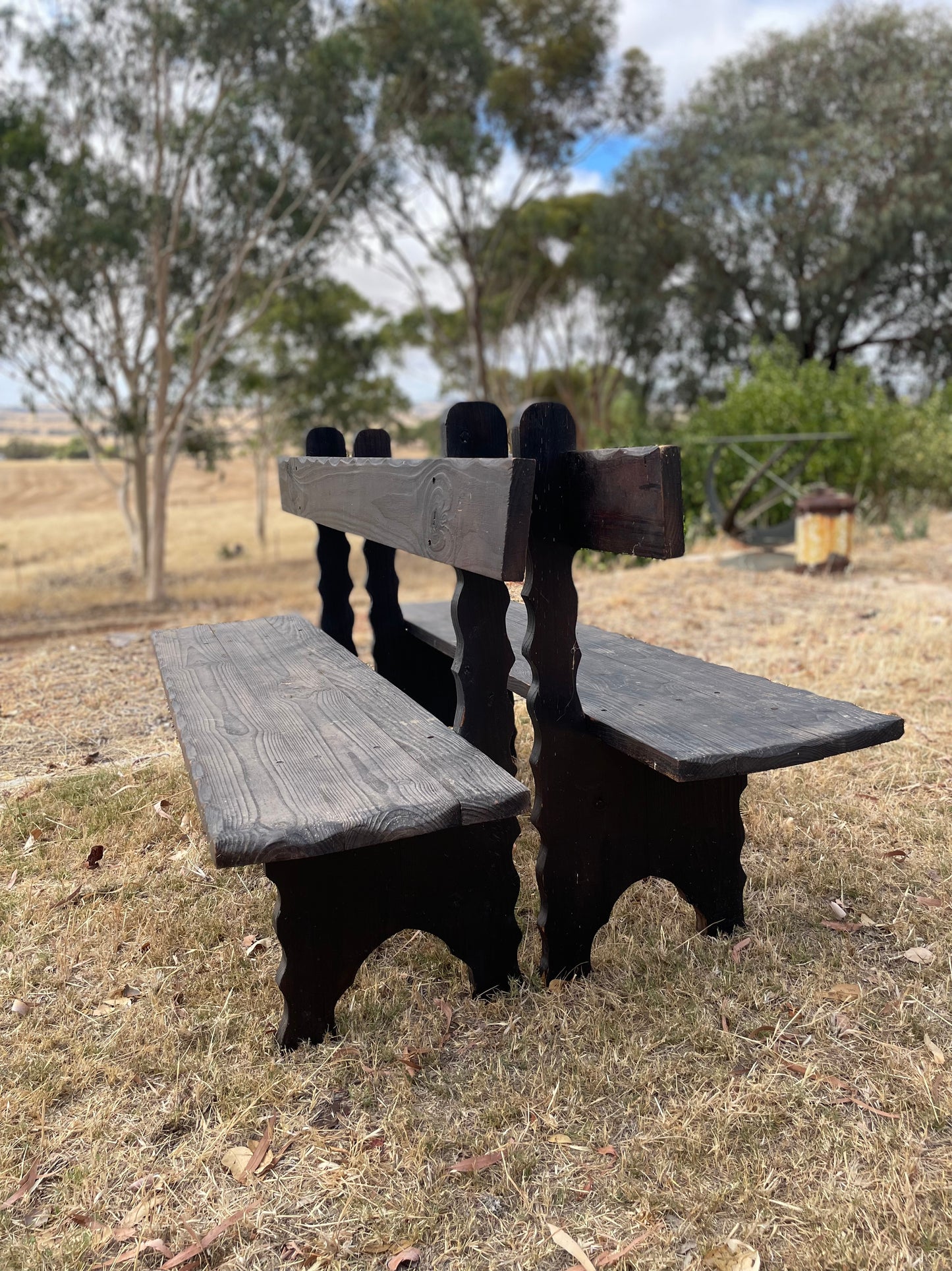 Pair of Ebonised Pine Spanish Monk Benches