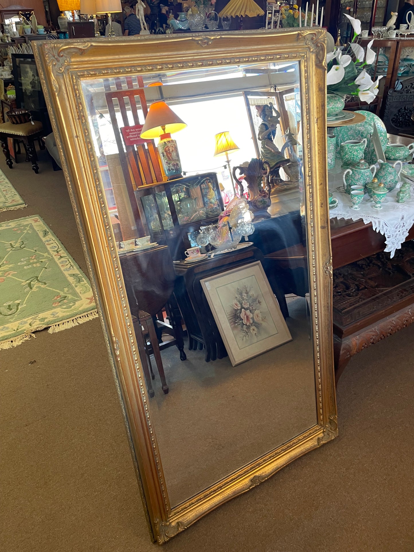 Large vintage ornate gilt framed mirror with beveled edge