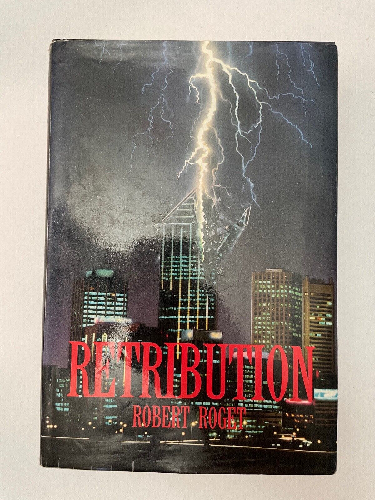 Retribution by Robert Roget. HCDJ 1990 1st Edition.