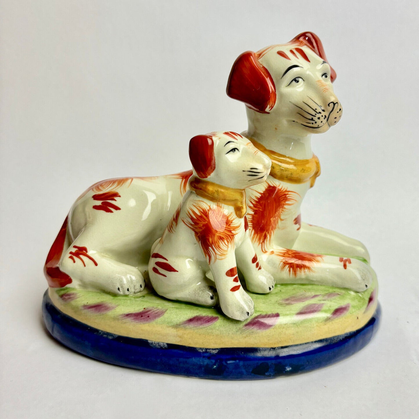Pair of Antique Staffordshire Terriers with Puppy Bookends