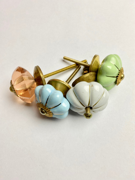 Four Vintage Door Knobs including porcelain and glass with brass mounts