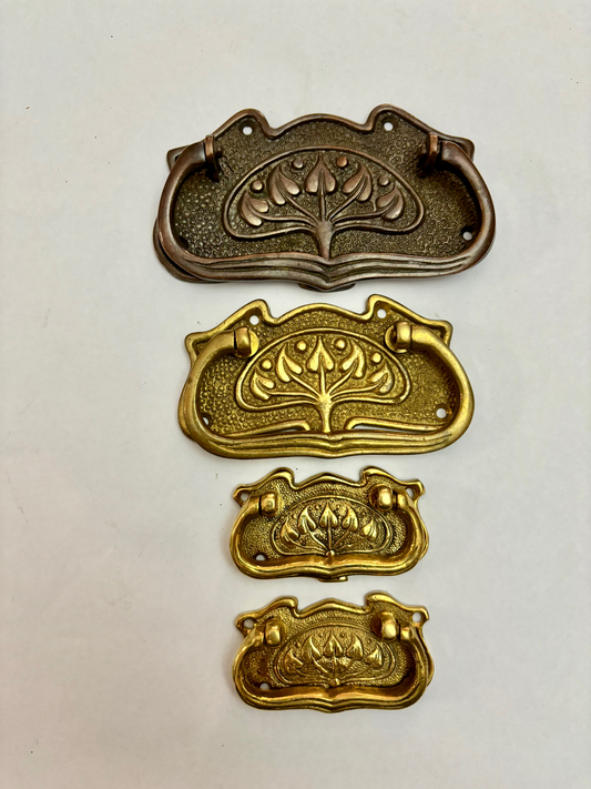 Four Large Mixed Antique Brass Drawer Pull Handles