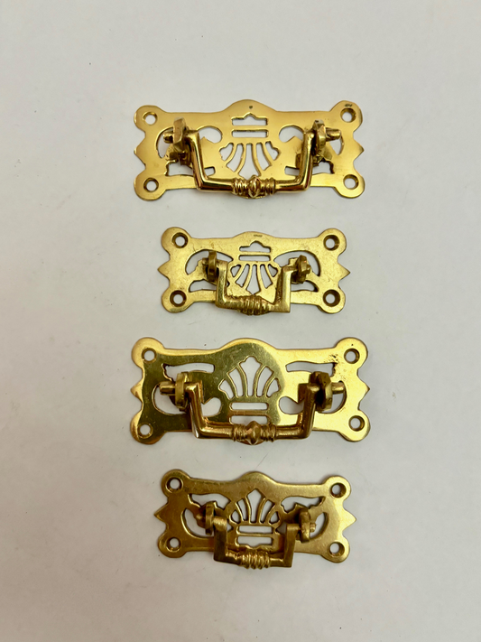Four Mixed Antique Brass Drawer Pull Handles