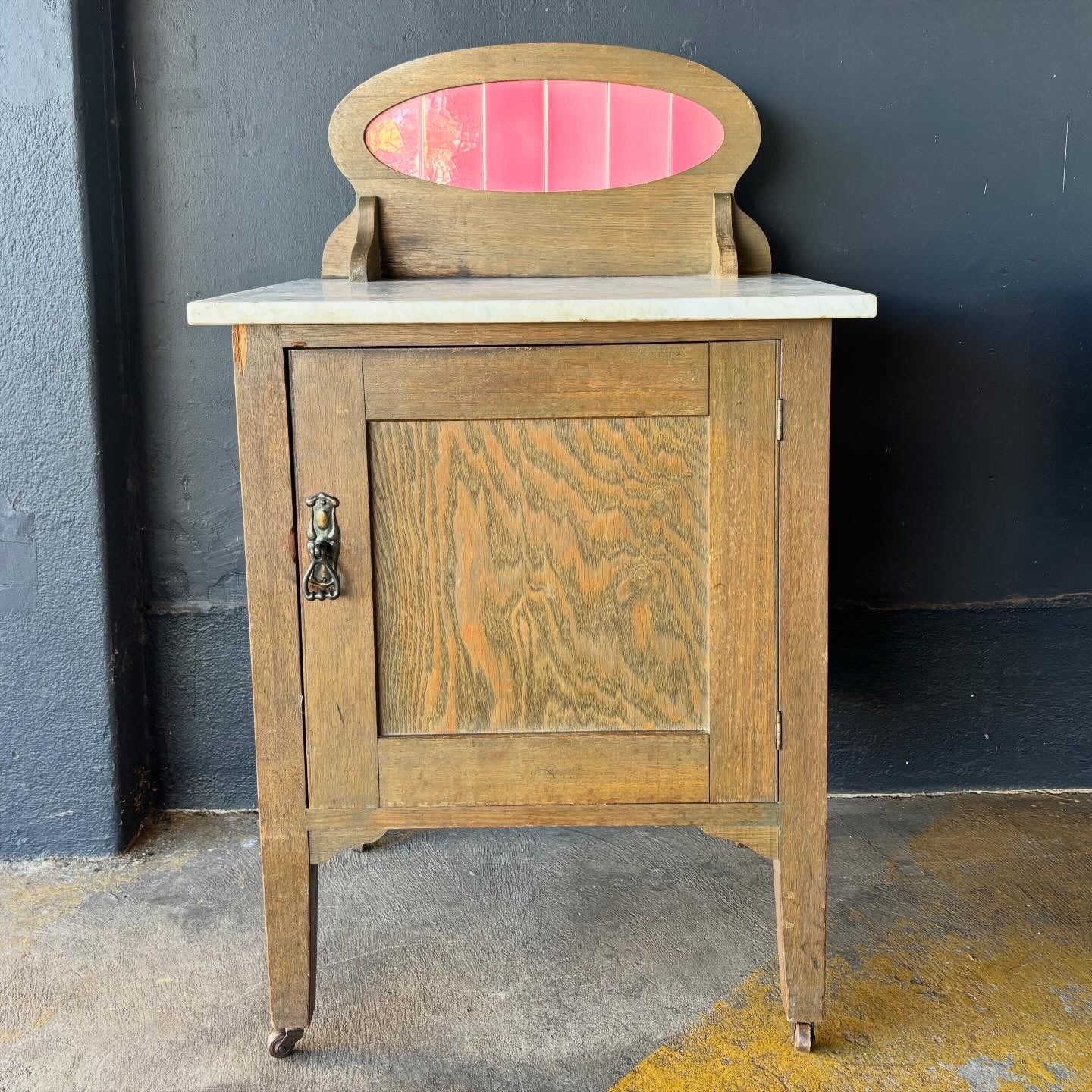 Antique Marble Top Washstand with Pink Tile Splashback on Castors