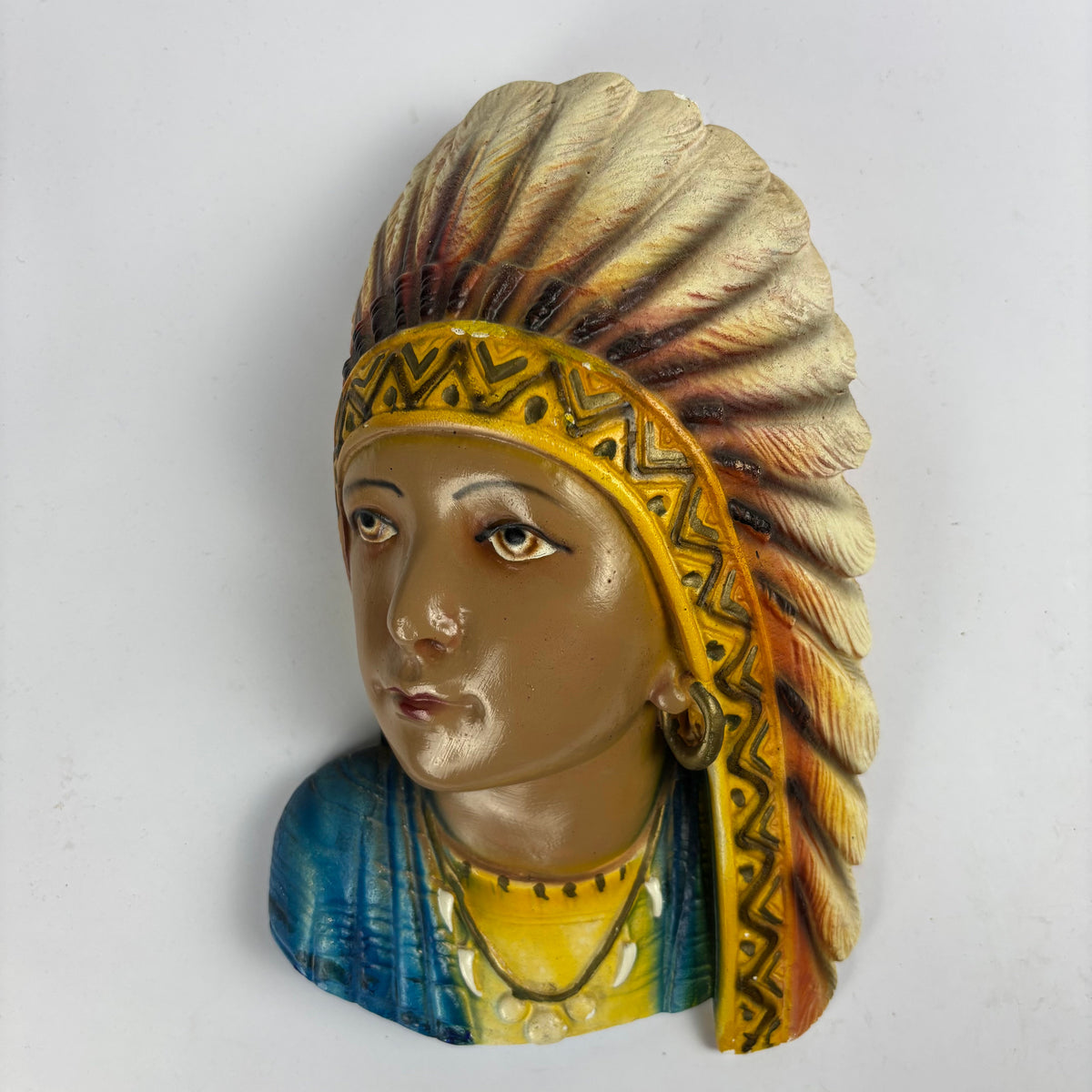 Vintage cream feather headdress painted plaster wall bust view 1