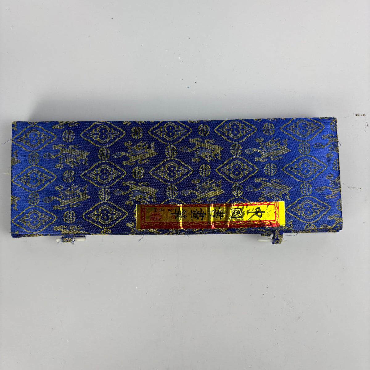 Seven Chinese calligraphy brushes in blue gold brocade case view 4