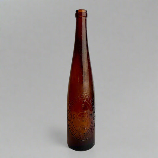 Brown bottle with embossed label on a white background